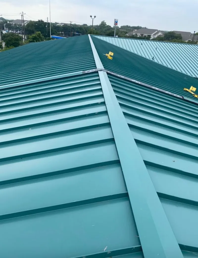 Green commercial metal roof ridge and valley for Metal Roof Repair in Rincon Valley